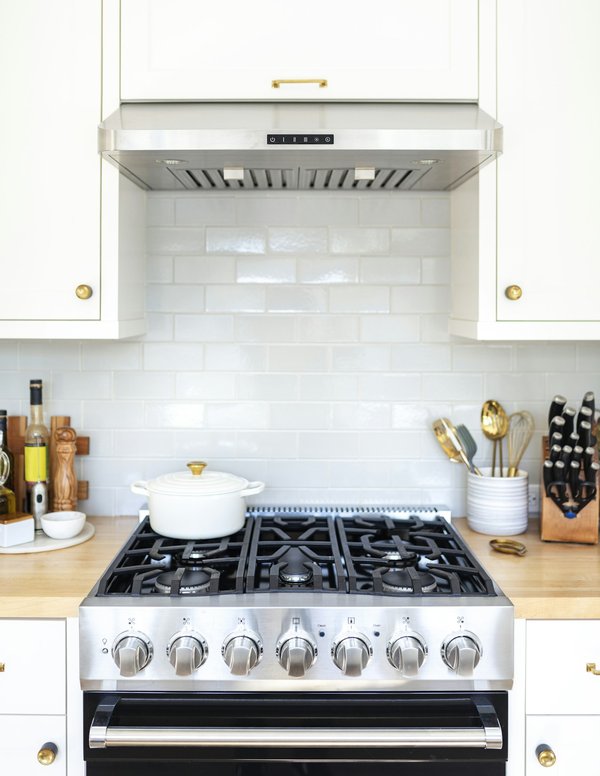 Recouvrir hotte de cuisine : guide pratique pour briller